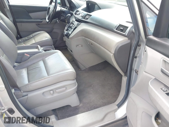 2012 Honda Odyssey EX-L with VIN 5FNRL5H63CB063815, listed as a IAAI auction lot 42302937 with 377,768 mi miles and . Bid and sale history available at DreamBid. Image 5.