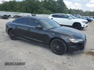 2016 Audi A6 Premium Plus with VIN WAUGFAFC0GN009716, listed as a Copart auction lot 56692645 with 82,189 mi miles and Salvage title. Bid and sale history available at DreamBid. Image 4.