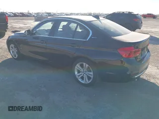 2017 BMW 3 Series 330e iPerformance with VIN WBA8E1C34HA156688, listed as a IAAI auction lot 41753490 with 74,130 mi miles. Bid and sale history available at carsss.com. Image 3.