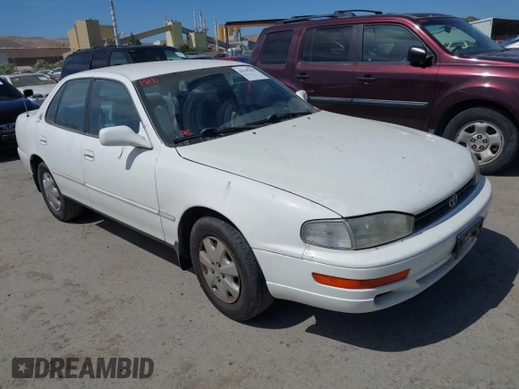 1993 Toyota Camry LE z VIN JT2SK12E0P0143650, wystawiony jako IAAI lot #42345181 z przebiegiem 264 350 mil mil oraz . Historia ofert i sprzedaży dostępna na DreamBid. Obrazek 1.