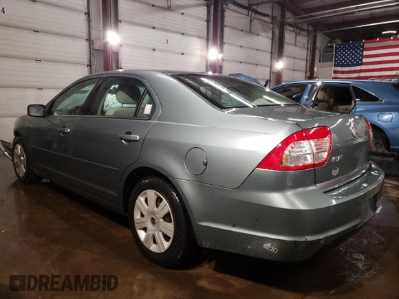 2006 Mercury Milan with VIN 3MEFM07Z06R655446, listed as a Copart auction lot 43464885 with 124,439 mi miles and Salvage title. Bid and sale history available at DreamBid. Image 2.