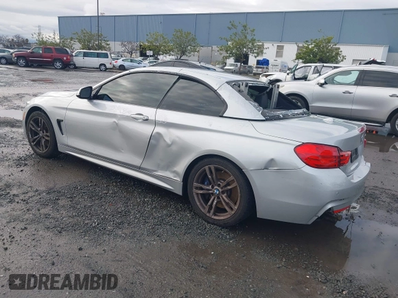 2015 BMW 4 Series 428i with VIN WBA3V7C50FP772915, listed as a IAAI auction lot 41526014 with 116,800 mi miles. Bid and sale history available at carsss.com. Image 3.