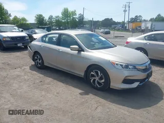 2017 Honda Accord LX with VIN 1HGCR2F33HA168044, listed as a IAAI auction lot 42106704 with 135,882 mi miles. Bid and sale history available at carsss.com. Image 1.