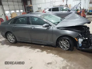 2015 Lincoln MKZ with VIN 3LN6L2G94FR607573, listed as a IAAI auction lot 41947202 with Not Provided miles and . Bid and sale history available at DreamBid. Image 13.