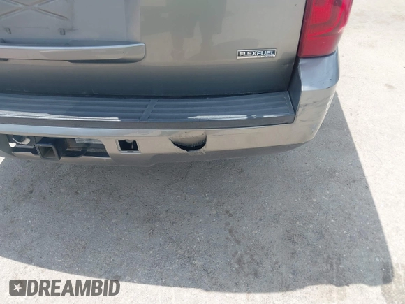 2007 Chevrolet Suburban LTZ with VIN 3GNFC16047G302161, listed as a IAAI auction lot 42053997 with 173,922 mi miles. Bid and sale history available at carsss.com. Image 6.