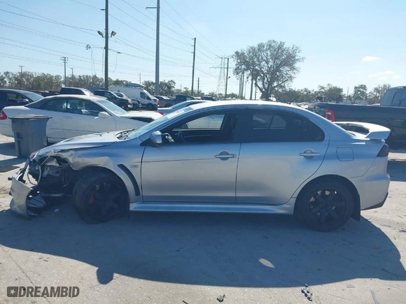 2013 Mitsubishi Lancer Evolution MR with VIN JA32W5FV6DU013470, listed as a IAAI auction lot 41544077 with 124262 miles. Bid and sale history available at carsss.com. Image 14.