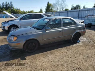 2005 Hyundai Accent GLS with VIN KMHCG45C05U605716, listed as a Copart auction lot 69445324 with 158,082 mi miles and Clean Title. Bid and sale history available at carsss.com. Image 1.
