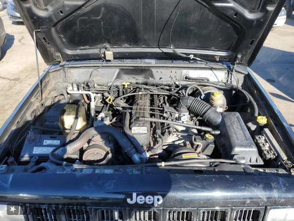 1998 Jeep Cherokee Sport with VIN 1J4FJ68S9WL137553, listed as a Copart auction lot 63561565 with 168,331 mi miles and Non repairable. Bid and sale history available at DreamBid. Image 12.