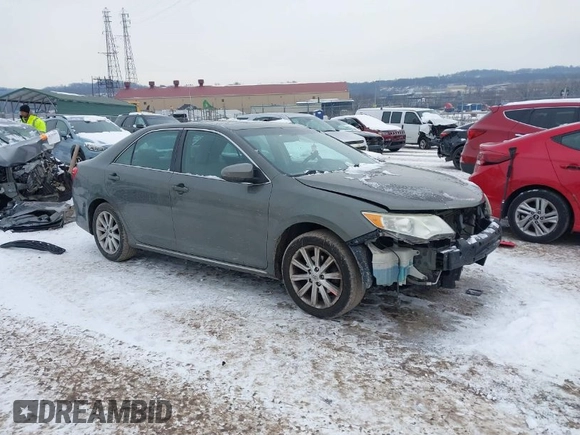 2014 Toyota Camry L with VIN 4T1BF1FK5EU774116, listed as a IAAI auction lot 41286569 with 184,797 mi miles. Bid and sale history available at carsss.com. Image 1.