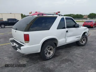 2003 Chevrolet Blazer Xtreme z VIN 1GNCS18X33K152868, wystawiony jako IAAI lot #39801584 z przebiegiem 167 157 mil mil oraz . Historia ofert i sprzedaży dostępna na DreamBid. Obrazek 4.