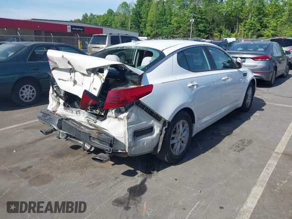 2013 Kia Optima LX z VIN KNAGM4A7XD5374109, wystawiony jako IAAI lot #42209534 z przebiegiem 184 578 mil mil oraz . Historia ofert i sprzedaży dostępna na DreamBid. Obrazek 4.