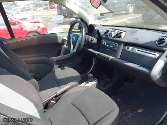 2012 Smart fortwo Pure with VIN WMEEJ3BA1CK560131, listed as a IAAI auction lot 41540976 with NaN miles. Bid and sale history available at carsss.com. Image 5.