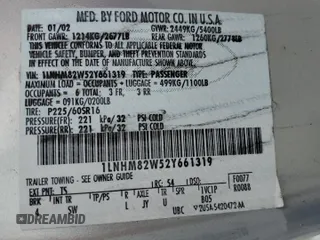 2002 Lincoln Town Car Signature z VIN 1LNHM82W52Y661319, wystawiony jako Copart lot #47887325 z przebiegiem 88 713 mil mil oraz Szkoda całkowita • Salvage title. Historia ofert i sprzedaży dostępna na DreamBid. Obrazek 12.