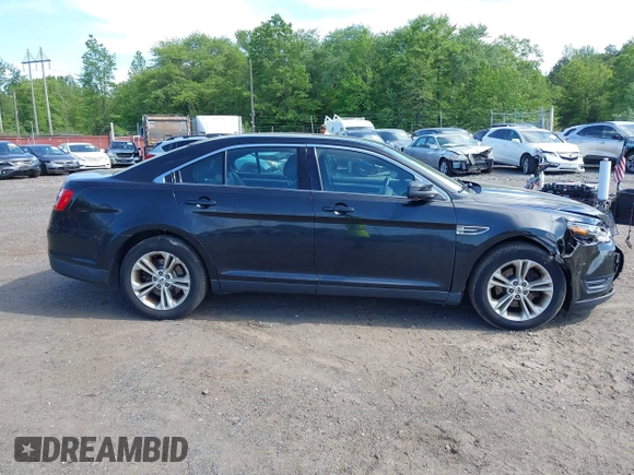 2015 Ford Taurus SEL with VIN 1FAHP2E88FG181055, listed as a IAAI auction lot 42307640 with 104,702 mi miles and . Bid and sale history available at DreamBid. Image 12.