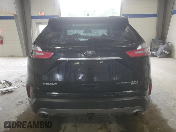 2020 Ford Edge Titanium z VIN 2FMPK4K97LBA67110, wystawiony jako Copart lot #57630365 z przebiegiem 49 646 mil mil oraz Szkoda całkowita • Salvage title. Historia ofert i sprzedaży dostępna na DreamBid. Obrazek 6.