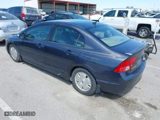 2007 Honda Civic Hybrid with VIN JHMFA362X7S027589, listed as a IAAI auction lot 42016320 with 181,110 mi miles. Bid and sale history available at carsss.com. Image 3.