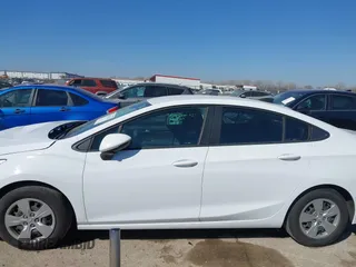 2017 Chevrolet Cruze LS z VIN 1G1BC5SM5H7156009, wystawiony jako IAAI lot #41667324 z przebiegiem 164 754 mil mil oraz . Historia ofert i sprzedaży dostępna na DreamBid. Obrazek 14.