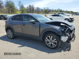 2021 Mazda CX-30 Preferred with VIN 3MVDMBCL5MM262458, listed as a Copart auction lot 56368995 with 77,394 mi miles and Salvage title. Bid and sale history available at DreamBid. Image 4.