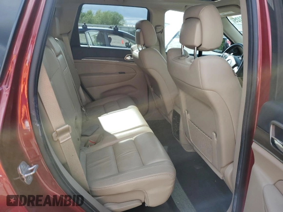 2014 Jeep Grand Cherokee Limited z VIN 1C4RJFBGXEC101022, wystawiony jako Copart lot #57526125 z przebiegiem 124 463 mil mil oraz Szkoda całkowita • Salvage title. Historia ofert i sprzedaży dostępna na DreamBid. Obrazek 11.