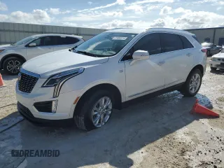 2022 Cadillac XT5 FWD Luxury z VIN 1GYKNAR44NZ178982, wystawiony jako Copart lot #77880614 z przebiegiem 32 078 mil mil oraz Nie do naprawy • Non repairable. Historia ofert i sprzedaży dostępna na DreamBid. Obrazek 1.