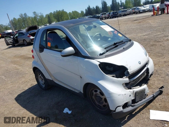 2012 Smart fortwo Pure z VIN WMEEJ3BAXCK563660, wystawiony jako IAAI lot #42165195 z przebiegiem 53 809 mil mil oraz . Historia ofert i sprzedaży dostępna na DreamBid. Obrazek 1.