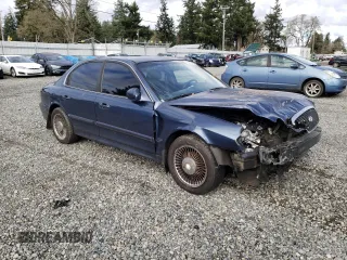 2002 Hyundai Sonata with VIN KMHWF25S12A520554, listed as a Copart auction lot 43483194 with 131,409 mi miles and Salvage Title. Bid and sale history available at carsss.com. Image 4.