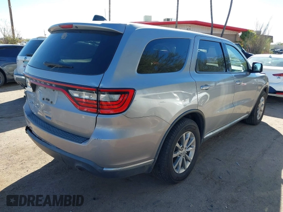 2016 Dodge Durango SXT with VIN 1C4RDHAG7GC502857, listed as a IAAI auction lot 40690221 with 192,620 mi miles and . Bid and sale history available at DreamBid. Image 4.