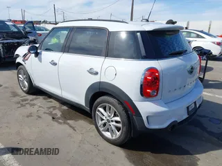 2014 MINI Countryman S with VIN WMWZC3C52EWP26869, listed as a IAAI auction lot 41756310 with 91,941 mi miles and . Bid and sale history available at DreamBid. Image 3.