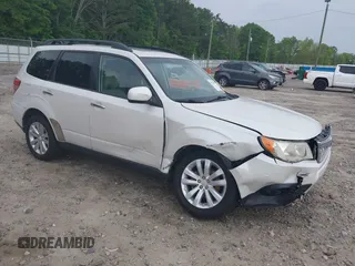 2012 Subaru Forester X Premium z VIN JF2SHBCC9CH404876, wystawiony jako IAAI lot #42145897 z przebiegiem 149 460 mil mil oraz . Historia ofert i sprzedaży dostępna na DreamBid. Obrazek 1.