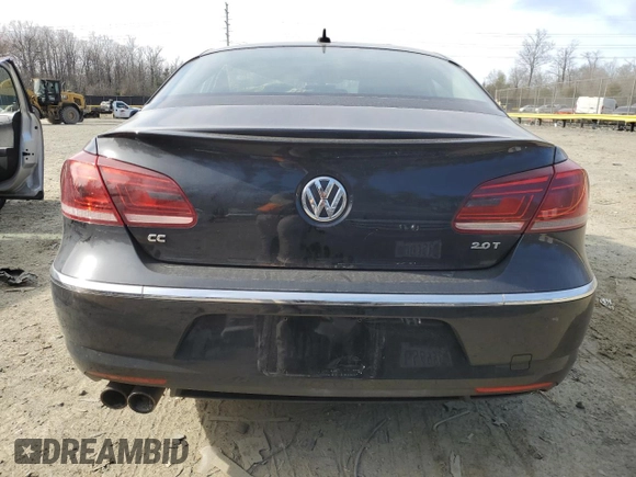 2015 Volkswagen CC Sport with VIN WVWBN7AN4FE814712, listed as a Copart auction lot 48027705 with 102,477 mi miles and Salvage Title. Bid and sale history available at DreamBid. Image 6.