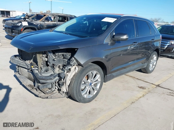 2019 Ford Edge Titanium with VIN 2FMPK3K97KBC46935, listed as a IAAI auction lot 41651078 with 163,387 mi miles. Bid and sale history available at carsss.com. Image 2.