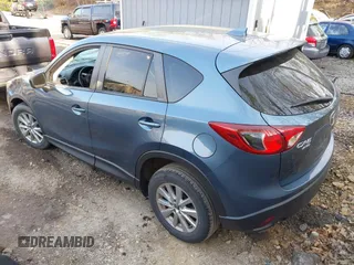 2016 Mazda CX-5 Touring with VIN JM3KE4CY5G0771252, listed as a IAAI auction lot 42138637 with 106,767 mi miles and . Bid and sale history available at carsss.com. Image 3.