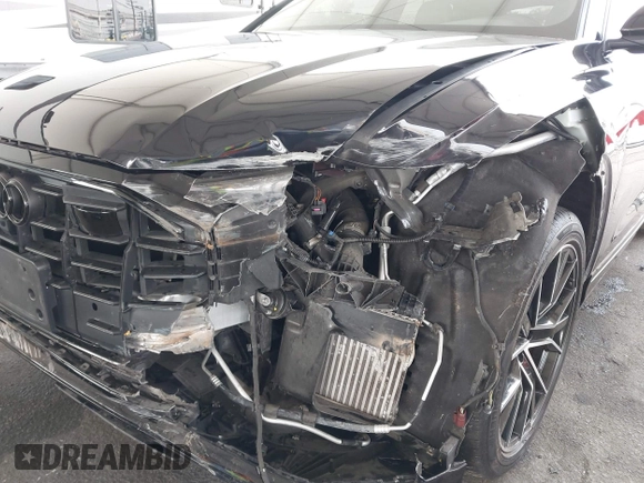 2021 Audi Q8 Premium Plus with VIN WA1EVAF1XMD033688, listed as a IAAI auction lot 42153256 with 41,701 mi miles and . Bid and sale history available at DreamBid. Image 6.