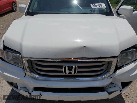 2012 Honda Ridgeline RTL with VIN 5FPYK1F56CB002709, listed as a Copart auction lot 62642495 with 116,416 mi miles and Salvage title. Bid and sale history available at DreamBid. Image 11.