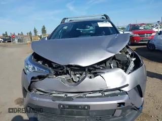 2019 Toyota C-HR XLE with VIN JTNKHMBX9K1044591, listed as a IAAI auction lot 42012934 with 139,858 mi miles and . Bid and sale history available at DreamBid. Image 12.