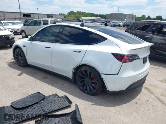 2021 Tesla Model Y Performance with VIN 5YJYGDEF9MF081798, listed as a IAAI auction lot 42033358 with 64,679 mi miles and . Bid and sale history available at DreamBid. Image 3.
