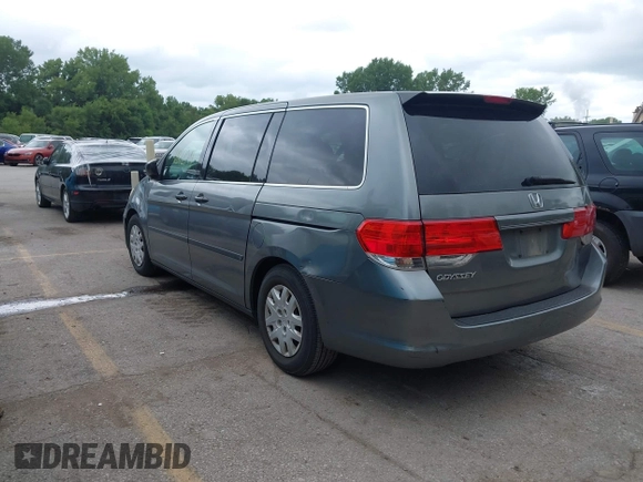 2009 Honda Odyssey LX with VIN 5FNRL38269B043326, listed as a IAAI auction lot 42872714 with 235,087 mi miles and . Bid and sale history available at DreamBid. Image 3.