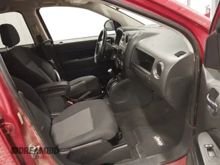 2010 Jeep Compass Sport with VIN 1J4NF4FB2AD506051, listed as a IAAI auction lot 41552084 with 218,785 mi miles. Bid and sale history available at carsss.com. Image 5.