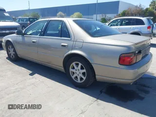 2002 Cadillac Seville Luxury SLS z VIN 1G6KS54Y92U207873, wystawiony jako IAAI lot #41957595 z przebiegiem 118 580 mil mil oraz . Historia ofert i sprzedaży dostępna na DreamBid. Obrazek 3.
