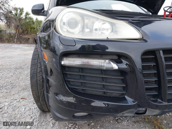 2009 Porsche Cayenne GTS with VIN WP1AD29P99LA62818, listed as a IAAI auction lot 41627073 with 166,414 mi miles. Bid and sale history available at carsss.com. Image 18.