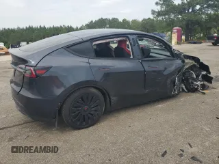 2024 Tesla Model Y z VIN 7SAYGDED4RA331714, wystawiony jako Copart lot #57043915 z przebiegiem Nie podano mil oraz Szkoda całkowita • Salvage title. Historia ofert i sprzedaży dostępna na DreamBid. Obrazek 3.