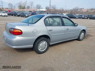 2000 Chevrolet Malibu with VIN 1G1ND52J3Y6260374, listed as a IAAI auction lot 41696175 with 128,903 mi miles. Bid and sale history available at carsss.com. Image 4.