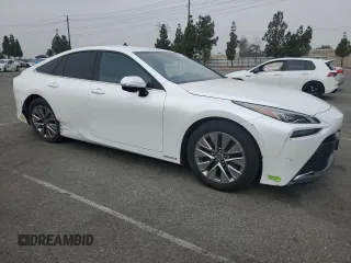 2023 Toyota Mirai XLE with VIN JTDAAAAA8PA009516, listed as a Copart auction lot 62543395 with 27,867 mi miles and Salvage title. Bid and sale history available at DreamBid. Image 4.
