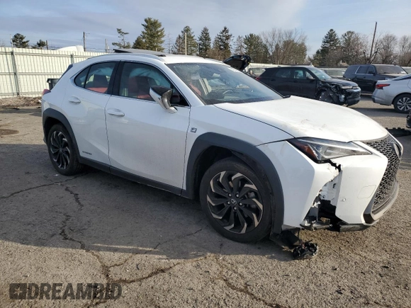2021 Lexus UX with VIN JTHR9JBH2M2049747, listed as a Copart auction lot 43319555 with 22,606 mi miles and Salvage Title. Bid and sale history available at carsss.com. Image 4.