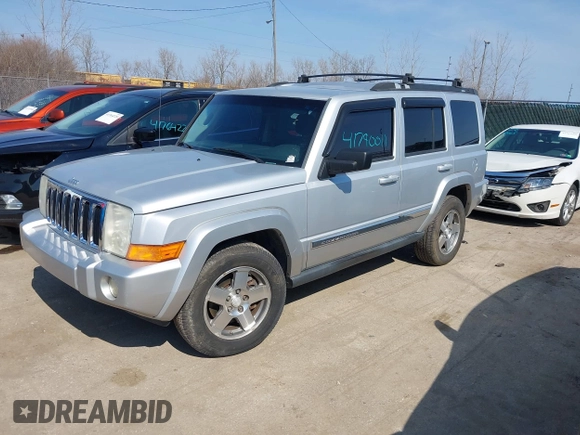 2010 Jeep Commander Sport z VIN 1J4RG4GK2AC105232, wystawiony jako IAAI lot #41790011 z przebiegiem 192 281 mil mil oraz . Historia ofert i sprzedaży dostępna na DreamBid. Obrazek 2.