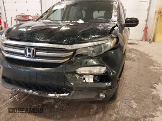 2016 Honda Pilot EX-L with VIN 5FNYF6H58GB012753, listed as a IAAI auction lot 41139479 with 175,842 mi miles and . Bid and sale history available at DreamBid. Image 6.