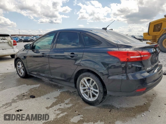 2015 Ford Focus SE with VIN 1FADP3F23FL242768, listed as a Copart auction lot 58068865 with 172,163 mi miles and Salvage title. Bid and sale history available at DreamBid. Image 2.
