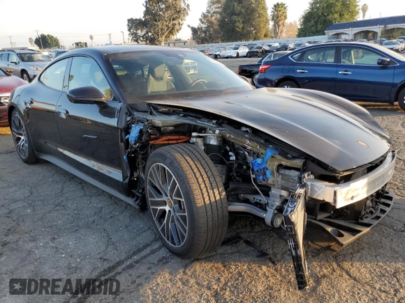 2024 Porsche Taycan with VIN WP0AA2Y10RSA10283, listed as a Copart auction lot 82637484 with 3,036 mi miles and Salvage title. Bid and sale history available at DreamBid. Image 4.
