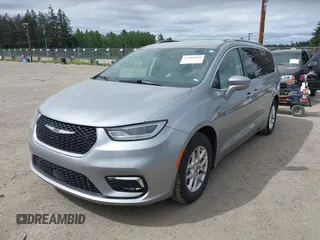 2021 Chrysler Pacifica Touring L with VIN 2C4RC1BG3MR552828, listed as a IAAI auction lot 42207838 with 67,917 mi miles and . Bid and sale history available at DreamBid. Image 17.