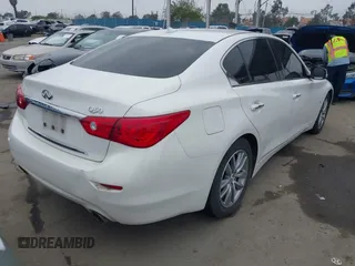 2015 Infiniti Q50 Premium with VIN JN1BV7AP6FM342619, listed as a IAAI auction lot 41871222 with 162,873 mi miles. Bid and sale history available at carsss.com. Image 4.